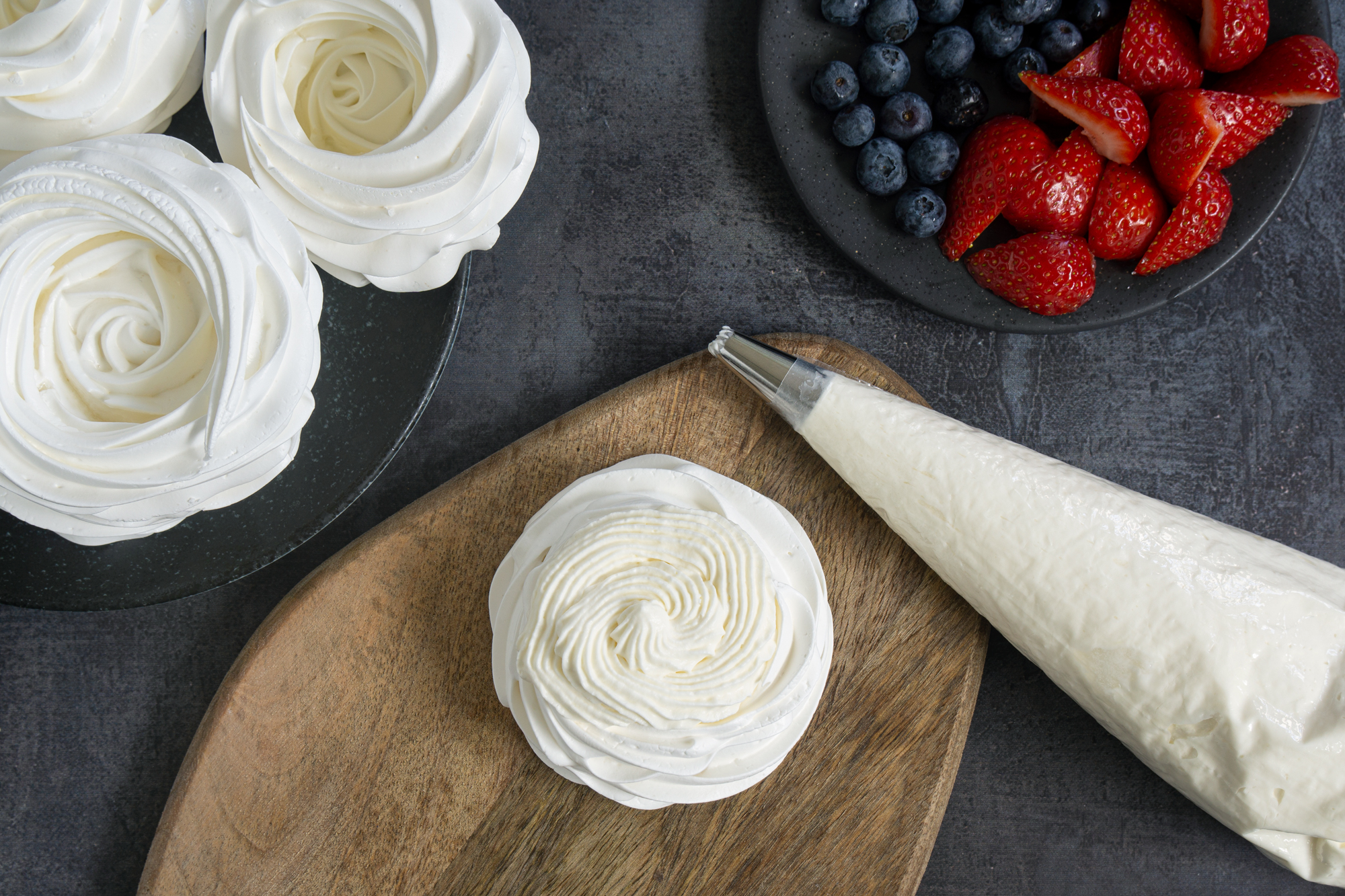 Fill meringues with cream