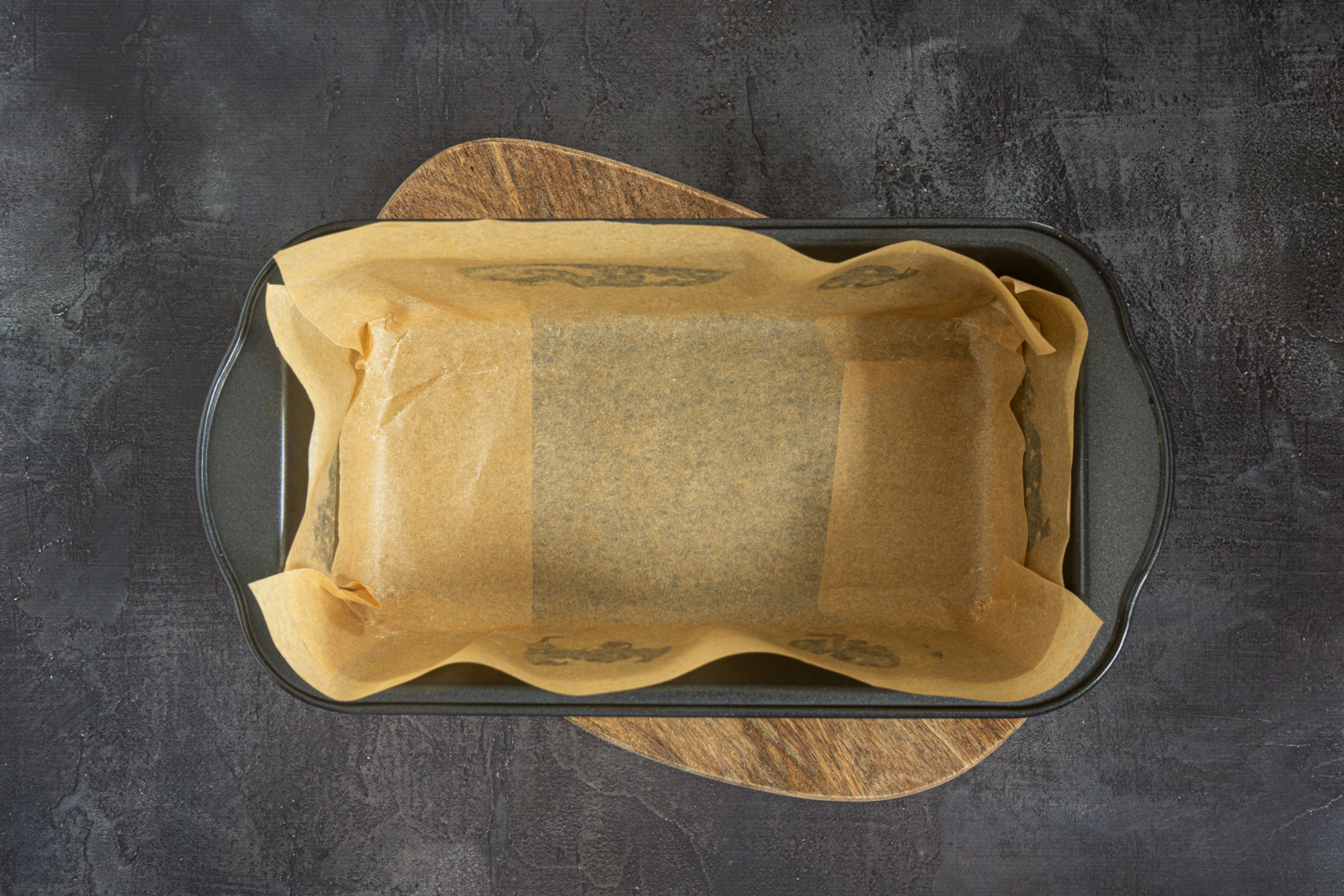 Baking pan lined with parchment paper