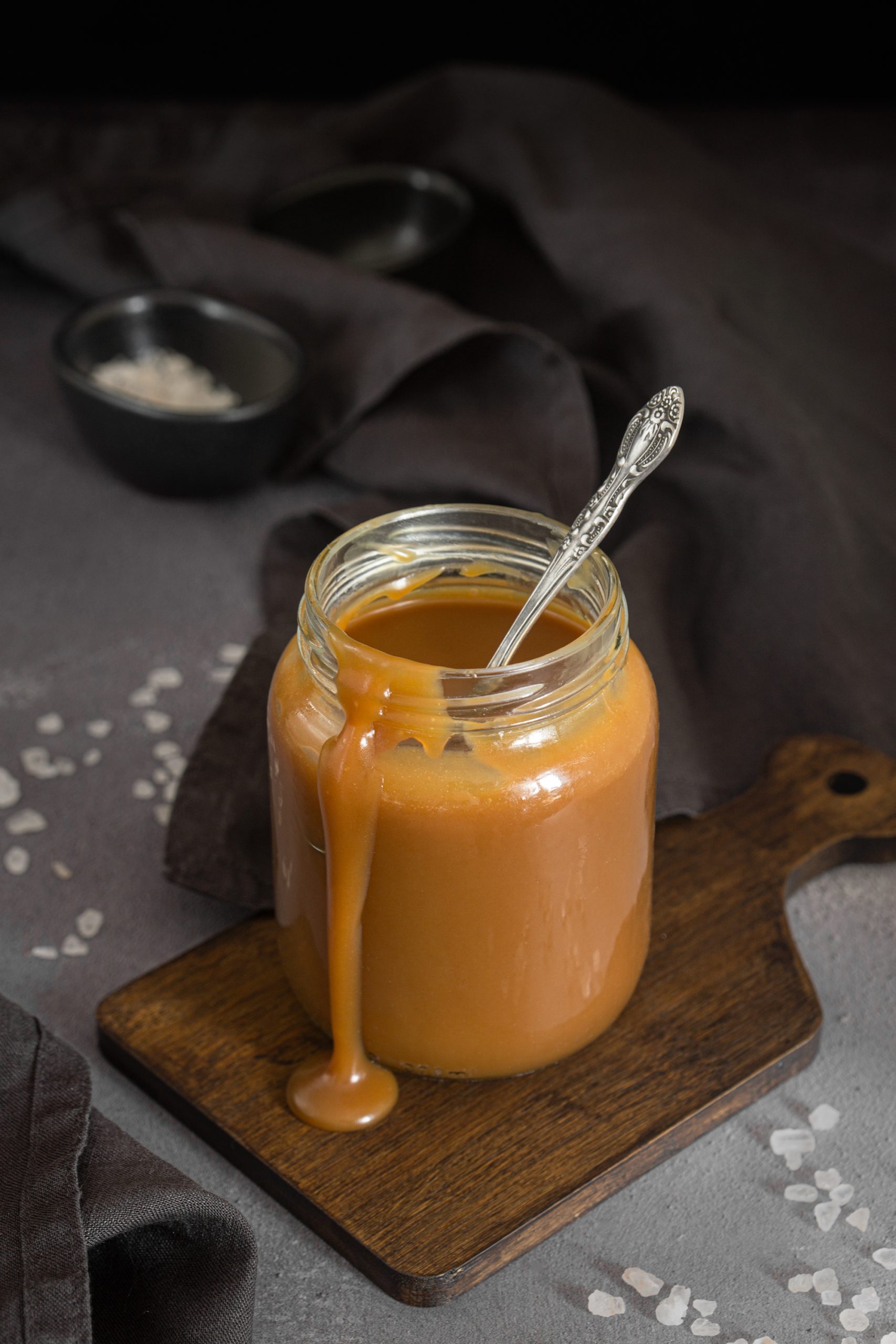 Salted caramel sauce in a glass jar