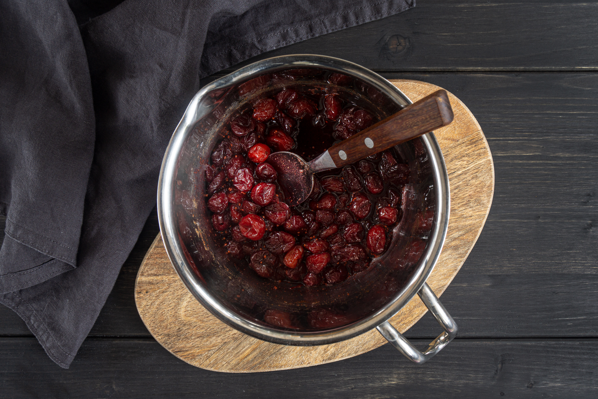 Cooked cranberries in a saucepan