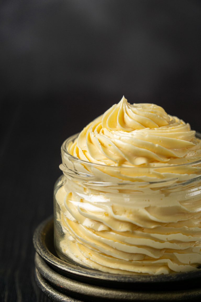 Close up of French buttercream in a glass jar