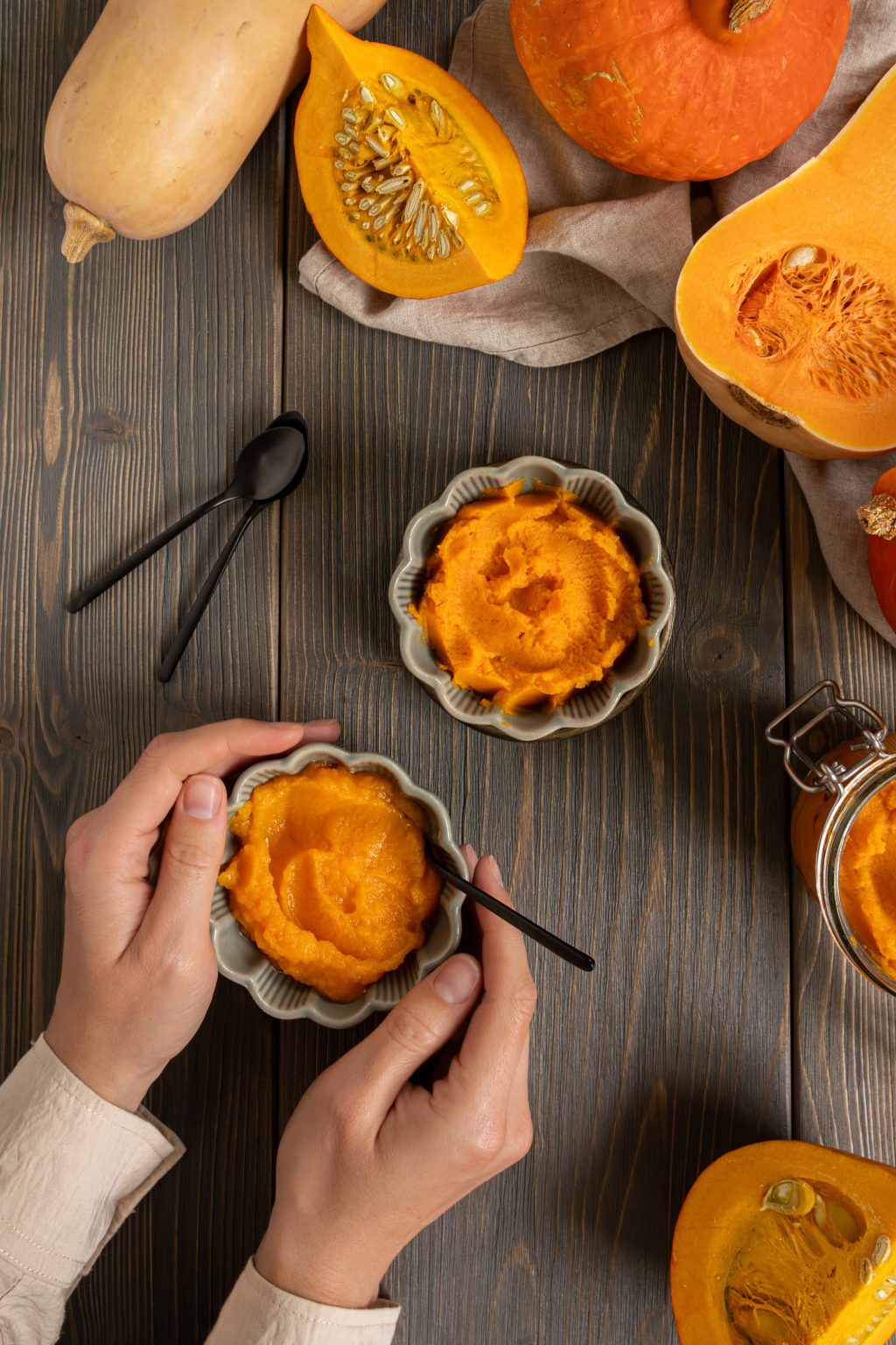 Top view of bowls filled with homemade pumpkin puree