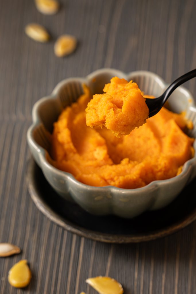 Close up of a bowl with strained homemade pumpkin puree