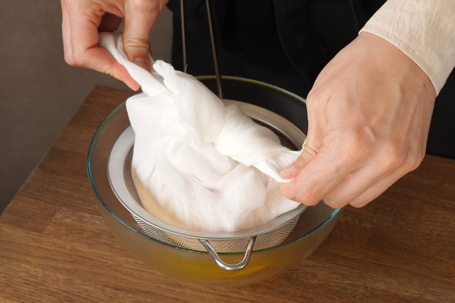 Tying ends of cheesecloth into the knot