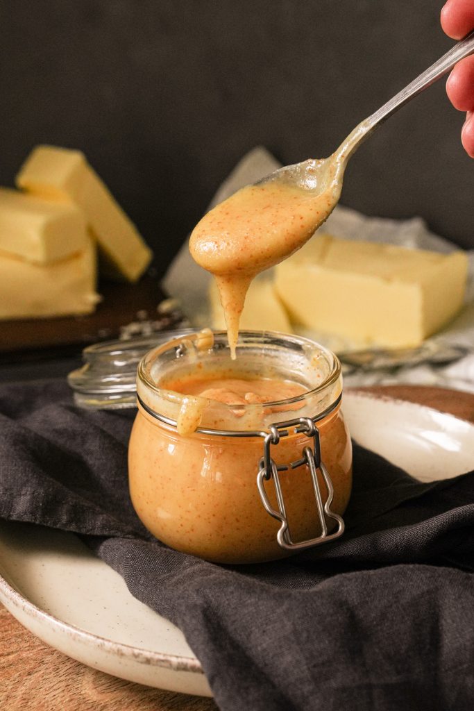 Room-temperature brown butter in a glass jar