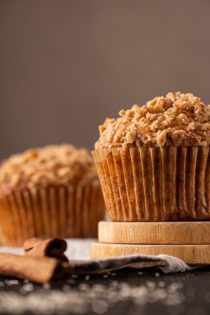 Close-up of brown butter apple muffin with crumble topping
