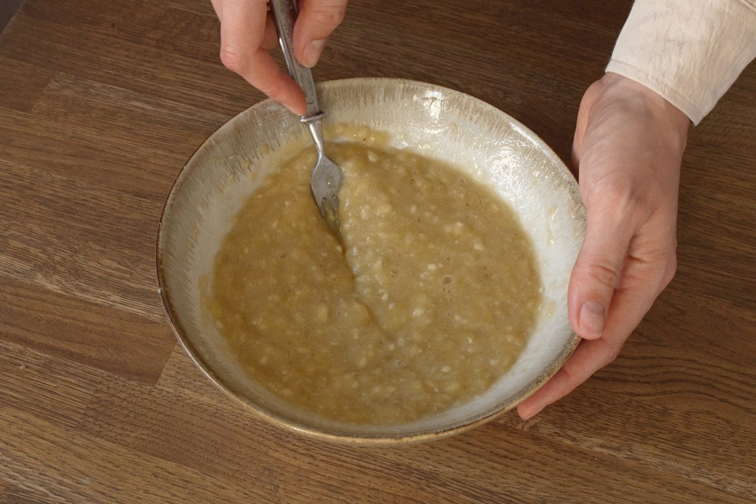 Bananas mashed with a fork
