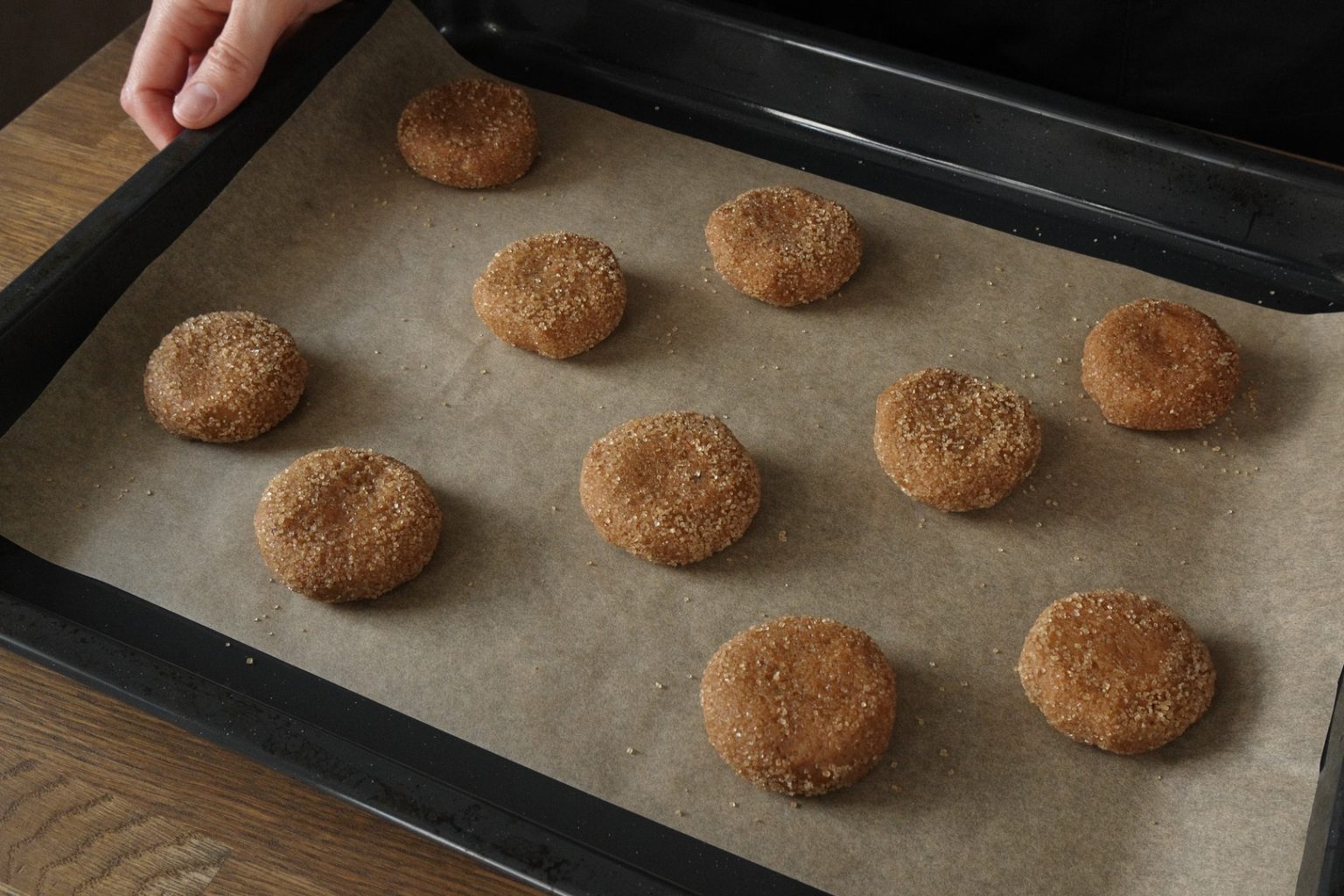 Brown butter pumpkin cookies ready to bake on a baking sheet